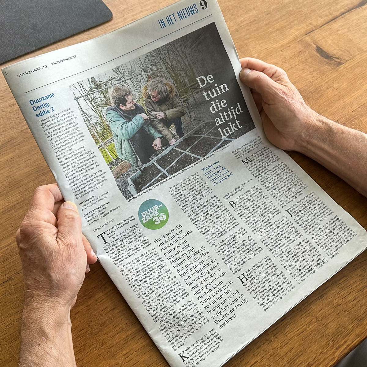 My father holding the Dagblad van het Noorden newspaper