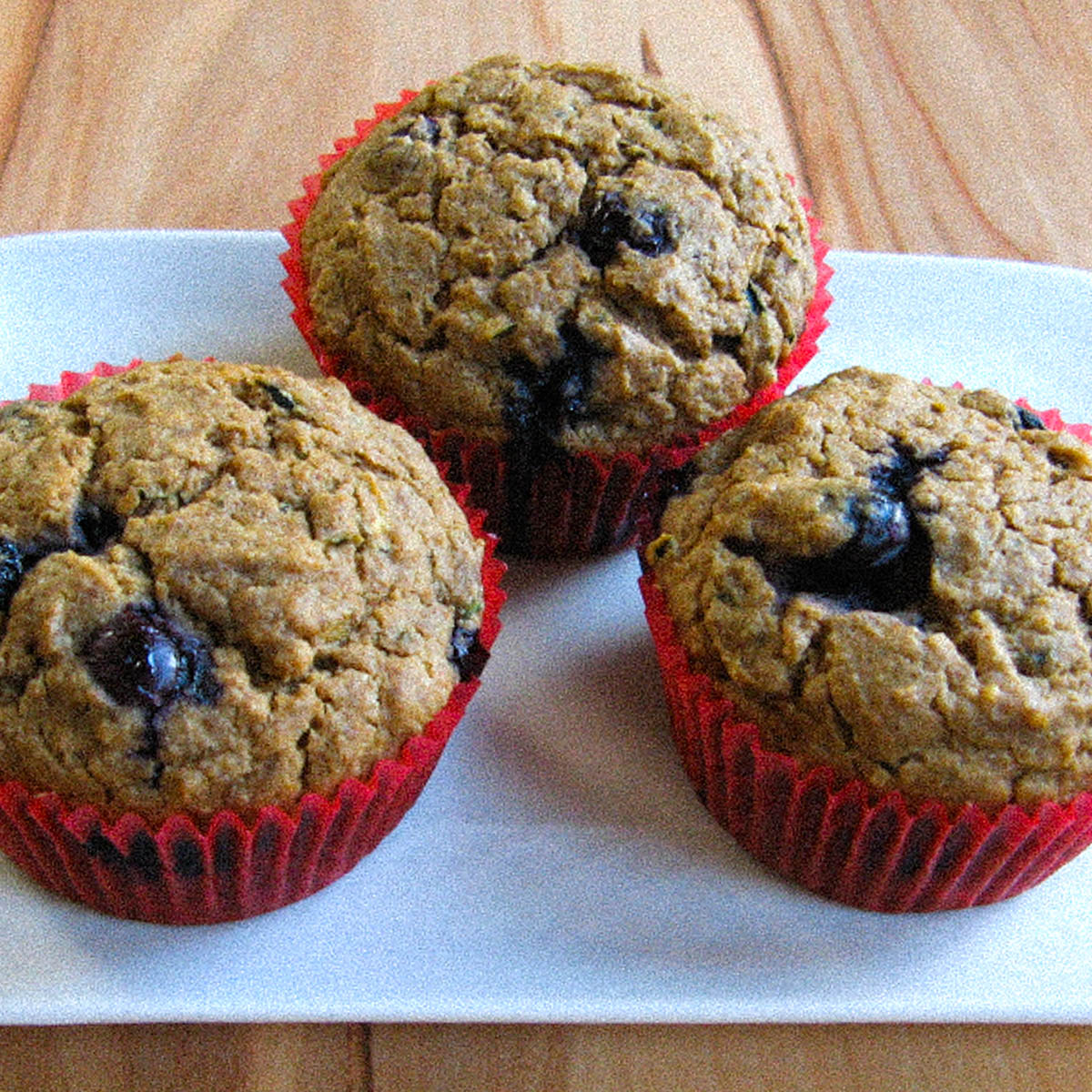 Cupcakes met blauwe bessen en courgette