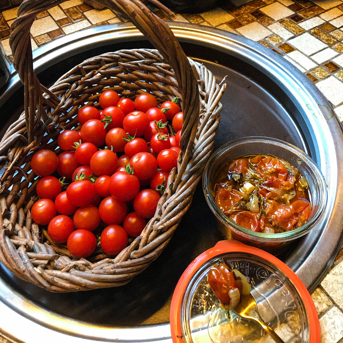Jars of preserved cherry tomatoes