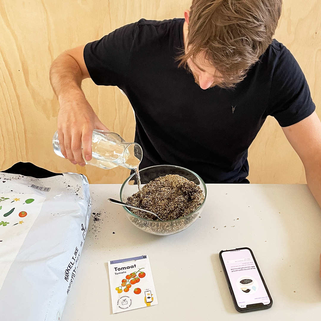 Water being added to the vermiculite and MM-Mix mixture